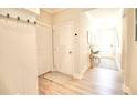 Bright hallway with modern decor and light wood floors at 605 Oak Ln, Canton, GA 30114