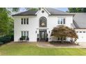 Beautifully landscaped front yard highlighting the two-story home at 5286 Wild Indigo Nw Way, Acworth, GA 30102