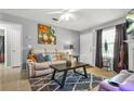 Cozy living room features modern decor and comfortable seating at 30 Creek Bottom Dr, Covington, GA 30014