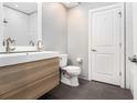 Modern bathroom featuring a double vanity, sleek fixtures, and a tiled shower at 2230 Cheshire Bridge Ne Rd # 401, Atlanta, GA 30324