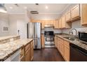 Well-equipped kitchen with stainless steel appliances, granite countertops, and ample cabinet space at 2230 Cheshire Bridge Ne Rd # 401, Atlanta, GA 30324