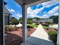 View of front yard and street from the front porch of this lovely home at 3804 Bay Orchard Lane, Loganville, GA 30052
