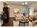 Comfortable living room with stylish decor, showcasing a blend of modern and traditional elements at 791 Bristol Way, Lithonia, GA 30058