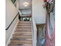 Welcoming entryway with hardwood stairs, neutral walls, and a view to the living room at 263 Bennett Farms Trl, Acworth, GA 30102