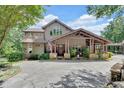 Charming two-story home with covered porch and driveway at 52 Waterside Se Dr, Cartersville, GA 30121