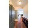 Welcoming entryway with hardwood floors and a view into the living space at 230 E Ponce De Leon Ave # 324, Decatur, GA 30030