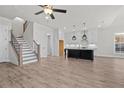 Open-concept living space with modern finishes, hardwood floors, and abundant natural light at 651 Summitt Hill Way, Cumming, GA 30040