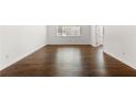 Bedroom with hardwood floors and bright lighting from window at 115 Biscayne Nw Dr # F1, Atlanta, GA 30309