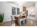 Cozy dining area with a modern table set and natural light at 3390 Kenland Se Rd, Smyrna, GA 30082