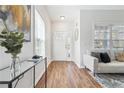 Inviting entryway and living area with hardwood floors, ample natural light, and a comfortable sofa at 260 Westview Sw Pl, Atlanta, GA 30314