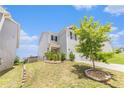 Attractive home showcasing its well-manicured landscaping, siding, and roof on a sunny day at 3350 Clawing Hawk Way, Douglasville, GA 30135