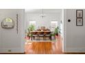 Bright dining room with hardwood floors, a chandelier, and windows offering natural light at 307 S Mcdonough St, Decatur, GA 30030