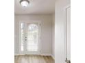 Welcoming entryway with a glass-paneled door and neutral flooring at 1001 Balsam Wood Trl, Villa Rica, GA 30180
