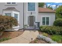Inviting front entrance with a beautifully landscaped walkway and stylish front door at 1430 Grovehurst Dr, Marietta, GA 30062