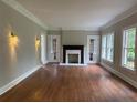 Bright living room with hardwood floors, fireplace, and French doors for a classic, inviting space at 1098 Oakdale Ne Rd, Atlanta, GA 30307