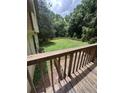 A lush backyard enclosed by a wooden fence, offering privacy and space at 2169 Tiffany Ln, Lithonia, GA 30058