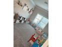 Bright Bedroom with large window for natural light and colorful decor at 126 Jacobs Ln, Loganville, GA 30052