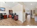 Bright home office featuring wood floors, large desks, and trim work at 3735 Westhaven Dr, Cumming, GA 30040