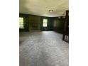Large living room with new carpet, a brick fireplace, and plenty of natural light at 2475 Cajun Dr, Marietta, GA 30066