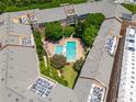 Aerial view showcasing community pools and manicured green spaces at Villa Sonoma at 10 Ne Perimeter Summit Blvd # 3107, Atlanta, GA 30319