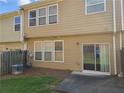 Cozy backyard featuring a patio, lawn, and privacy fence at 1865 Ellison Lakes Nw Ct # 21, Kennesaw, GA 30152