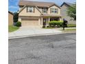 Attractive two-story home featuring an attached two-car garage at 948 Regency Dr, Lawrenceville, GA 30044