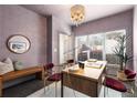 Bright home office featuring a modern desk, stylish decor, and a sunlit window creating an ideal workspace at 616 Angier Ne Ave # 4, Atlanta, GA 30308
