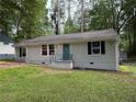 Charming single-story home with freshly painted exterior and well-maintained front lawn at 2943 Westbury Dr, Decatur, GA 30033