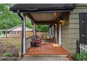 Inviting covered front porch with seating, perfect for relaxing outdoors at 778 Mclendon Dr, Decatur, GA 30079