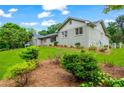 The home features a well-maintained lawn and thoughtful landscaping accentuating the architecture at 4049 Northlake Creek Cv, Tucker, GA 30084