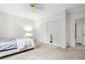 Neutral bedroom with double closets, light walls, and a cozy atmosphere at 1732 Winding Woods Ln, Jonesboro, GA 30236