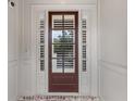 Elegant front door with sidelights and transom window, providing a warm welcome at 2291 Falmouth Se Ct # 23, Smyrna, GA 30080