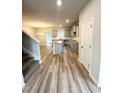 Beautiful kitchen with a center island, stainless appliances, and ample cabinet space at 123 Deer Xing, Temple, GA 30179