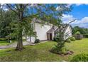 Beautiful two-story home with manicured lawn and landscaping at 6177 Idlewood Cir, Lithonia, GA 30038