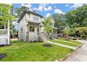 Exterior of a home with a well-manicured lawn and inviting front porch at 1695 Thomas St, Decatur, GA 30032