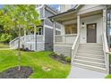 Inviting front porch with stylish railings and well-maintained landscaping at 1695 Thomas St, Decatur, GA 30032