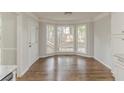 Eat-in kitchen area with a bay window that offers an abundance of natural light and a view of the backyard at 3614 Spring Leaf Ln, Acworth, GA 30101