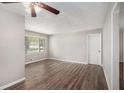 Spacious living room featuring hardwood floors, neutral walls, and natural light at 637 Carlouetta Sw Rd, Mableton, GA 30126