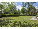 Expansive backyard features a well-maintained lawn, perfect for outdoor activities and relaxation at 2671 Bohler Nw Rd, Atlanta, GA 30327