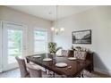 Elegant dining room featuring hardwood floors and refined decor at 235 Orchard Dr, Covington, GA 30014