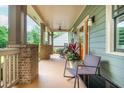 Inviting front porch with seating, offering a relaxing outdoor space with stylish decor at 177 Ridgeland Ave, Decatur, GA 30030
