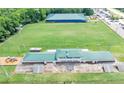 Aerial view of a recreation area with sports fields and a covered shelter at 109 Paulownia Cir, Mcdonough, GA 30253
