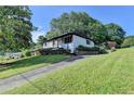 Charming white brick home with well-maintained lawn and a private driveway at 3991 Adamsville Sw Dr, Atlanta, GA 30331