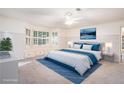 Serene main bedroom with bay window, plush carpeting, and a calming color palette at 1488 White Columns Blvd, Canton, GA 30115