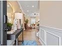 Inviting entryway with a view into the open-concept living area and stylish decor at 22 Jacobs Farm Ln # 11, Lawrenceville, GA 30045