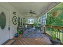 Cozy front porch with seating, a ceiling fan, and decorative accents, perfect for relaxing outdoors at 3411 Morgan Rd, Canton, GA 30115