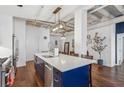 Kitchen island with a white countertop and stainless steel appliances at 805 Peachtree Ne St # 411, Atlanta, GA 30308