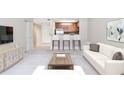 Open-concept living room with kitchen view and modern decor creates an inviting space at 3650 Ashford Dunwoody Ne Rd # 514, Atlanta, GA 30319