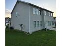 Spacious backyard with a well-maintained lawn and ample room for outdoor activities at 7703 Hansel Ln, Lithonia, GA 30058