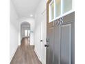 Inviting entryway with modern flooring and stylish front door with address numbers at 1958 Dillon Dr, Lithonia, GA 30058